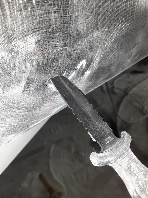 Knife through sheet metal